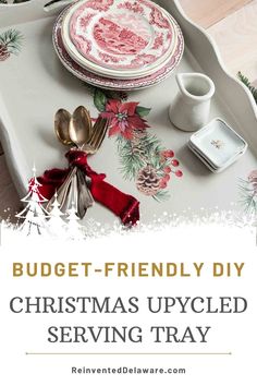 a christmas themed serving tray with silverware on it and the words budget - friendly diy christmas upcycled serving tray