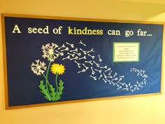 a seed of kindness can go far bulletin board with dandelions and words on it