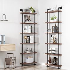 two bookshelves in the corner of a room