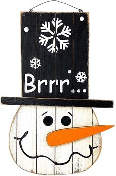 a wooden sign with a snowman's face and hat on it that says brrr