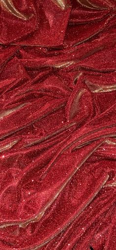 red and gold glitter fabric with wavy lines