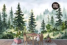 there is a table and chairs in front of a forest wall mural with trees on it