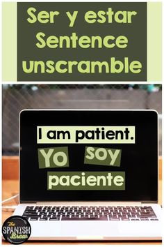 an open laptop computer sitting on top of a wooden table next to a sign that says i am patient yo soy paciente