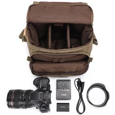 a camera and its accessories are shown in this image, including a bag with the lens attached to it