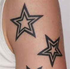 three star tattoos on the arm and shoulder