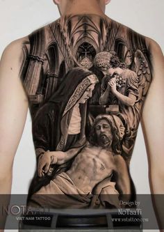 the back of a man's body with an image of jesus and other people on it