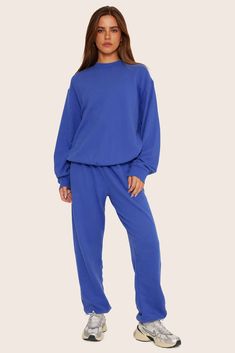 CLASSIC CREWNECK Athleisure Crew Neck Sweater In Solid Color, Solid Color Crew Neck Sweater For Athleisure, Blue Sweatshirt For Fall Loungewear, Cozy Long Sleeve Sweats With Elastic Cuffs, Blue Fleece Crew Neck Sweats, Fall Crew Neck Sweats With Ribbed Waistband, Cozy Fleece Crew Neck Sweats, Fleece Sweatshirt With Ribbed Cuffs And Crew Neck, Cozy Fit Blue Sweatshirt With Ribbed Cuffs