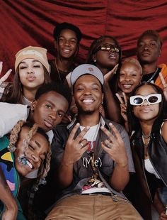 a group of young people posing for a photo