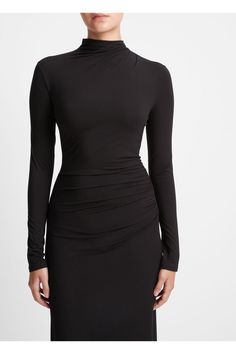 Find VINCE Ruched Long-sleeve Turtleneck Dress on Editorialist. Crafted from soft stretch jersey, this elegant body-skimming dress features a turtleneck and is ruched at the neck and hip for a sophisticated look. The dress is designed to slip on and can be dry cleaned only. The fabric composition is 92% Rayon, 8% spandex. Draped Ruched Bodycon Dress In Elastane, Draped Ruched Elastane Bodycon Dress, Draped Ruched Bodycon Dress, Ruched Draped Bodycon Dress In Elastane, Fitted Long Sleeve Bodycon Dress With Ruched Bodice, High Neck Ruched Bodycon Dress For Evening, High Neck Ruched Bodycon Evening Dress, Elegant Ruched Bodycon Dress For Fall, High Neck Ruched Dress For Fall