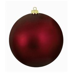 a red ball ornament with a gold ribbon hanging from it's side