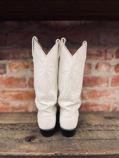 Brand: Dan Post Shaft length: 12” Heel height: 2” Material: Leather *All boots are FINAL SALE. Please feel free to reach out to us via email or instagram for more details/photos White Round Toe Heeled Boots For Western Events, White Snip Toe Mid-calf Boots For Western-themed Events, Western White Snip Toe Knee-high Boots, White Wide Calf Snip Toe Knee-high Boots, White Fitted Mid-calf Boots With Snip Toe, White Heeled Boots With Wide Calf And Snip Toe, White Wide Calf Snip Toe Boots, White Wide Calf Snip Toe Heeled Boots, White Wide Calf Boots With Snip Toe