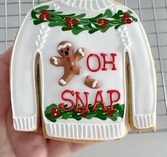 a decorated cookie with the words oh snap on it