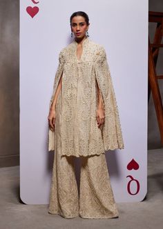 A dazzling showcase of hand embroideries and intricate details, our jane cape set is a masterful creation, featuring an opulently embellished voluminous cape, sumptuously adorned pants, and a charming blouse. Cape Set, Cape Designs, Indian Outfits, Intricate Details, Hand Embroidery, Cape, Fashion Inspo, Boutique, Embroidery