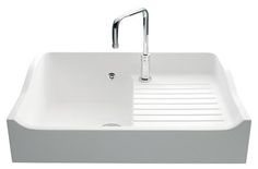 a large white sink with a faucet on the side and a chrome faucet