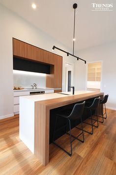 the kitchen is clean and ready to be used as a dining room or office space