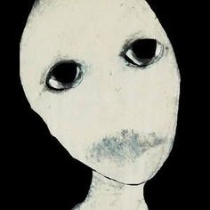 an alien with big eyes is shown in black and white