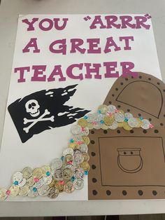 a sign that says you're a great teacher with coins and a pirate chest