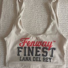 a white tank top with the words'fenway finest lana del rey'on it