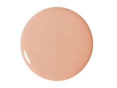 a round light pink color on a white background with the top half painted in beige