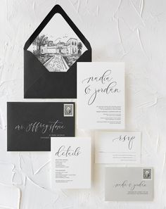 black and white wedding stationery with an envelope, letterpress and monogrammed calligraphy