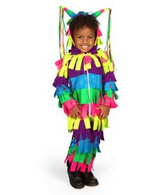 a young child wearing a colorful costume