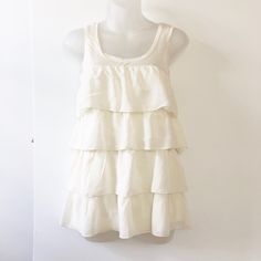 Nwt H&M Cream Ruffled Layered Top, Very Cute And Flowy. Brand New, Never Worn. Small Makeup Mark Inside Will Wash Out, It Was Bought That Way. White Tiered Top With Ruffle Hem, Casual White Tiered Top, White Tiered Casual Tops, White Tiered Summer Top, White Tiered Tops For Summer, Chic White Tiered Top, Feminine Tiered Ruffle Tops, White Ruffled Tops For Layering, Casual Fitted Tiered Top