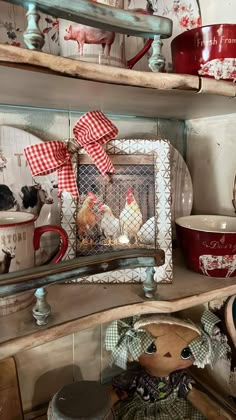 the shelves are filled with dishes and knick knacks