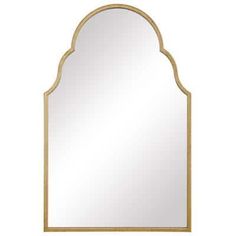 an arched mirror with gold trimmings and a wooden frame on the bottom, against a white background