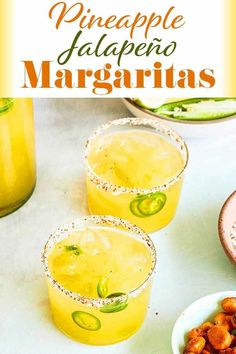 pineapple jalapeno margaritas are served in glasses with garnishes