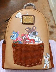 Disney Dogs mini backpack with corduroy pockets in the front and on the sides. Manufactured by Loungefly under a license from Disney. Sold exclusively Disney Dogs, Loungefly Disney, Mini Backpack, Brand New, Disney, Dogs