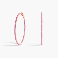 Demure, blushing pink sapphires trace the clean, elegant line of this 14k rose gold hoop creating a seamless display of warm light and vibrant color. Blue Nile, Precious Gemstones, Gold Hoop, Pink Sapphire, Warm Light, Gemstone Earrings, Blush Pink, Gemstone Jewelry, Sapphire