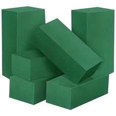 several green boxes stacked on top of each other in the shape of rectangles