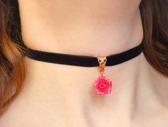 "Black velvet ribbon choker with sculpted pink pearl rose. Rose material is polymer clay with the special pearl cover. Each petal of flower made by hand without any mold Dia flower 13-15 mm/ 0.45-0.55 \" Length of necklace is adjustable:  10-12 inches/ 25,4 - 30,5 cm 11-13 inches/ 28-33 cm 12-14 inches/ 30.5- 35.5 cm 13-15 inches/ 33-38 cm 14-16 inches/ 35.5 cm-40.5 cm 15-17 inches/ 38,1 cm- 43,2 cm 16-18 inches/ 40.6 cm- 45.7 cm 17-19 inches/ 43 cm - 48 cm 18-20 inches/ 45,7 - 50,8 cm     Τhe length you choose considered to be with lobster clasp and one connecting ring +2 inches extended chain. Width of ribbon 10 mm / 0.4 inches     If you need other length of necklace let me know and I will make it for you. Polymer clay isn't afraid of water, strong and non-toxic. Gorgeous gift for women Rose Choker Diy, Rose Design Choker As Gift, Gift Rose Design Choker In Rose Color, Rose Design Choker Necklace, Adjustable Rose Choker For Parties, Adjustable Rose Choker Necklace, Black Rose Choker, Navy Blue Earrings, Rose Choker