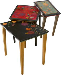 three tables with different designs on them