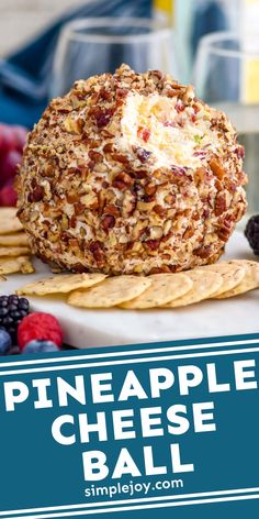 a pineapple cheese ball is sitting on top of crackers