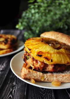 a grilled pineapple sandwich on a white plate