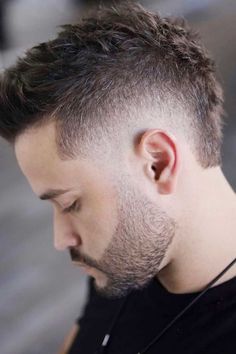 Looking for a fresh and edgy haircut? Check out these trendy burst fade styles! From short to medium length, there's a look for every man. #glaminati #menshaircuts #burstfade #fadehaircut #fadehairstyle Faded Faux Hawk Men, Mohawk Haircut Mens, Modern Mohawk Men Faux Hawk, High Fade Mullet, Mohawk Fade Men, Modern Mohawk Men, Mullet Hawk, Faux Mullet, Faux Hawk Mullet