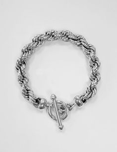 "925 Sterling Silver thick Rope Chain Bracelet Classic model, A timeless, unchangeable moderate design. High end, Handcrafted Silver smith work. made : 925 Genuine Sterling Silver (Not Silver plated, Nor silver coated) Solid, Twisted handcraft design. Length: 8 1/4 , 8 1/2 , 8 3/4 or 9\" Weight : approx. 57.9 g and up Rope Thickness: 10.5 mm (0.41 inch)" Silver Sterling Chain Bracelet With Toggle Clasp, Classic Silver Chain Bracelet With Toggle Clasp, Classic Rope Chain Bracelet, Classic Sterling Silver Bracelet With Toggle Clasp, Silver Braided Ring, Silver Rope Bracelet, Mexican Silver Jewelry, 10k Gold Chain, Monogram Bracelet