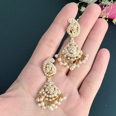 Featuring a 22k gold jadau rani haar set in all pearls. The necklace weighs 73.35 gms including 2.30 gms in the hanging beads and 23.25 gms in the 4 lines of pearls strings. The earrings weigh 10.75 gms including 1.15 gms in the hanging pearl beads White 22k Gold Kundan Necklace With Intricate Design, Gold Bridal Necklace With Pearl Drop For Diwali, White 22k Gold Kundan Necklace For Diwali, Diwali White Kundan Necklace In 22k Gold, Gold Kundan Necklace With Stone Work For Eid, 22k Gold Meenakari White Jewelry, Diwali Yellow Gold Jewelry With Pearl Drop, Diwali Yellow Gold Pearl Drop Jewelry, Gold Pearl Temple Necklace For Festive Occasions