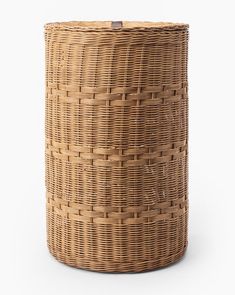 a round wicker basket on a white background