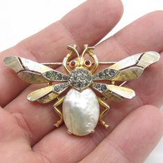 Vintage 50-60's Signed Crown Trifari, Gold Plated Bee Brooch, Mother Of Pearl Belly And Rhinestones. This Is A Vintage, Previously Owned Item. Has Small Areas On The Wings Where Gold Has Come Off, Please Look At Photos Carefully For A Happy Purchase Trifari Jewelry, Bee Brooch, Crown Trifari, The Wings, Gift List, Antique Jewelry, Mother Of Pearl, Favorite Jewelry, Vintage Antiques