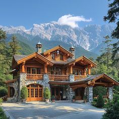 a large wooden house surrounded by trees and mountains