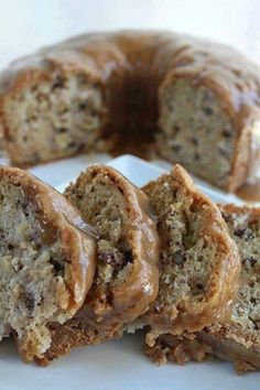 a bundt cake is cut in half on a plate