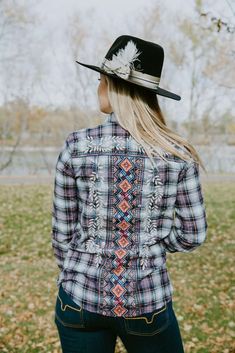 A classic is re-imagined with our Ellie Button Back Shirt! This timeless pattern is elevated by the bold embroidered flowers painting the front and back. Pair with your favorite boot cut denim or fitted leggings and sneakers for an effortless, laid-back look. Add gold jewelry and an embroidered or leather tote to finish the look. Ships Internationally, to the USA and Canada All prices in Canadian Dollars Button Back Shirt, Back Painting, Back Shirt, Boot Cut Denim