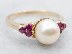 This exquisite ring features a lustrous saltwater pearl and sparkling synthetic pink sapphires. The combination of these stones creates a luxurious and elegant piece of jewelry, perfect for special occasions or adding a touch of sophistication to any outfit. Metal: 10K Yellow GoldGem: Saltwater PearlAccents: Synthetic Pink Sapphires .20 CaratsRing Size: 7 Saltwater Pearls, Pink Sapphire Ring, Pearl Ring, Pink Sapphire, Sapphire Ring, Sapphire, Sparkle, Size 7, Ring