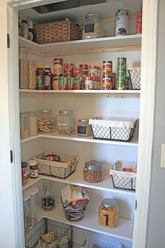 an organized pantry with lots of food in it