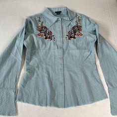 Brand New Without Tags Excellent Condition Embroidered Collared Blue Tops, Casual Blue Embroidered Shirt, Blue Embroidered Collared Blouse, Blue Cotton Shirt With Floral Embroidery, Blue Button-up Tops With Floral Embroidery, Blue Embroidered Collared Shirt, Blue Floral Embroidered Button-up Top, Blue Button-up Shirt With Floral Embroidery, Blue Collared Shirt With Floral Embroidery