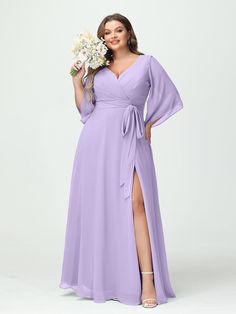 a woman in a long purple dress holding a flower and posing for the camera with her hand on her hip