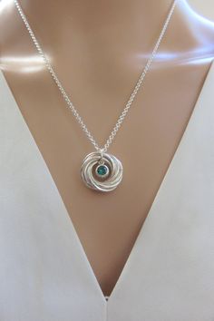 "New! 9 Ring Sterling Silver Necklace with Swarovski SS Bezel Set Birthstone Earrings that go nicely with the necklace: https://etsy.me/3tuzwsR https://etsy.me/3edsD95 This beautiful handcrafted love knot eternity necklace features nine sterling silver rings that are intertwined and hanging from a nice quality sterling silver chain and finished with a sturdy lobster clasp. The findings are all sterling silver. The Swarovski crystal birthstone is bezel set in sterling silver. This necklace makes Eternity Necklace, Happy 90th Birthday, 90th Birthday Gifts, Birthday Gift For Women, Birthstone Earrings, Gift For Woman, 90th Birthday, Birthstone Earring, Love Knot