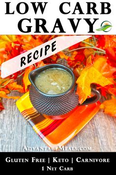 a bowl of soup sitting on top of a plate with autumn leaves around it and the words low carb gravy recipe